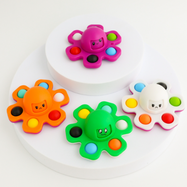 Fingertip spinning octopus with changing face