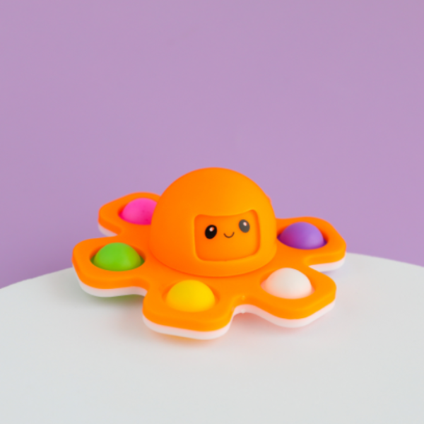 Fingertip spinning octopus with changing face